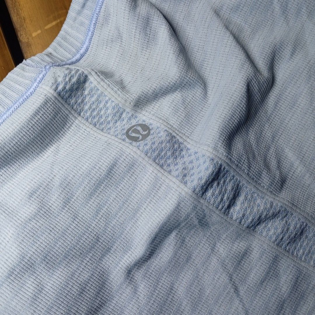 Lululemon Swiftly Tech Short Sleeve Crew Light Blue (Category: Activewear) located in Davao. Submitted by tj-289a (Listing ID 1468990316, Image 2). Description: - Brand: Lululemon - Color: Light blue - Style: Short sleeve, seamless ribbed knit with classic curve lines - Details: Iconic silver omega logo near the lower hem - Material: Breathable fabric, ideal for gym workouts or running - Condition: Excellent, kept in clean closet storage.