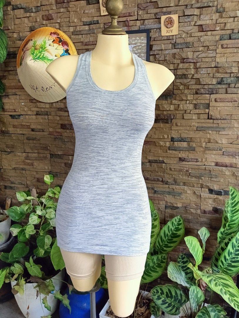 Lululemon Top Cool Racerback (Category: Activewear) located in Rizal. Submitted by timeless_shop (Listing ID 1468987724, Image 3). Description: ORIGINAL Lululemon Cool Racerback Tank - Heathered Light Gray -6 📏 Length: 25 inches 📏 Width : 13 inches Bust Fit 32-34 👚 Size: 6 🎨 Color: Heathered Light Gray / White - rare colorway! ✂️ Cut: Racerback - sexy sa likod, free movement 💯 Condition: 9.9/10 🎨 Color Rate: 9.9/10 - Maayos at malinis din �