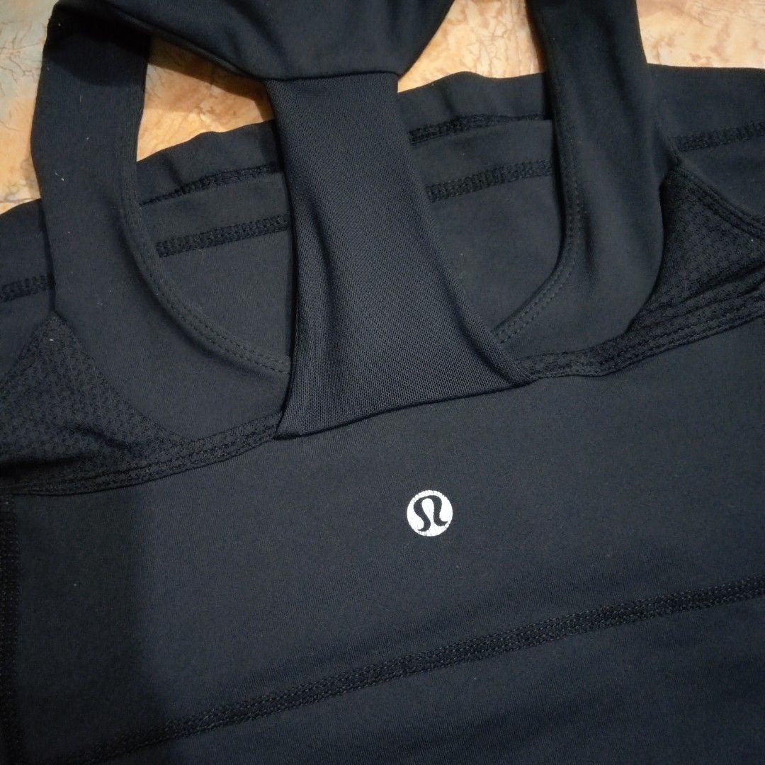 Lululemon Tank Top Bundle | Black & Teal (Category: Sleeveless) located in Valenzuela. Submitted by 0003c4 (Listing ID 1469048591, Image 3). Description: - both fits xs to small :)) - teal one is padded, the black is not but u can insert pad - both in good condition location: Valenzuela or Malabon mod: lalamove or jnt.