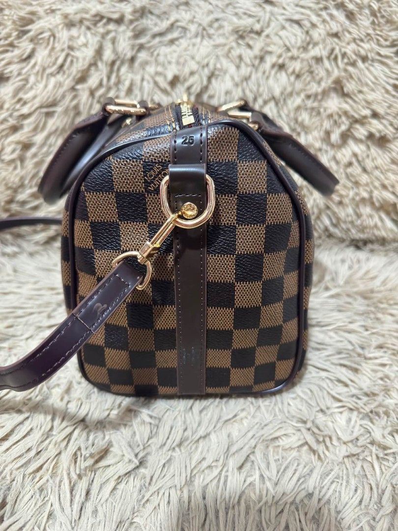 Lv bandolier Damier (Category: Luxury Bags & Wallets) located in Manila. Submitted by vilmabrandedukaybags (Listing ID 1469076581, Image 3). Description: L V SPEEDY BANDOULIER DOCTOR’S BAG Damier Ebene Canvas Small size or 25cm With Padlock and Sling Strap Pm🤗.
