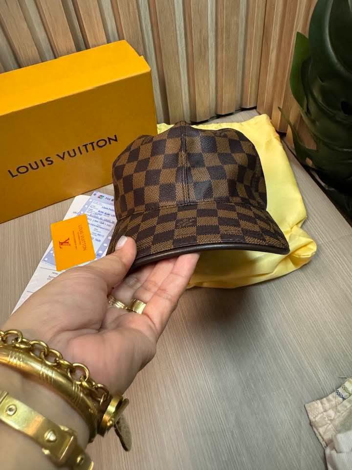 Lv Damier cap (Category: Luxury Apparel) located in Manila. Submitted by vilmabrandedukaybags (Listing ID 1469077477, Image 3). Description: Lv Damier cap medium size.