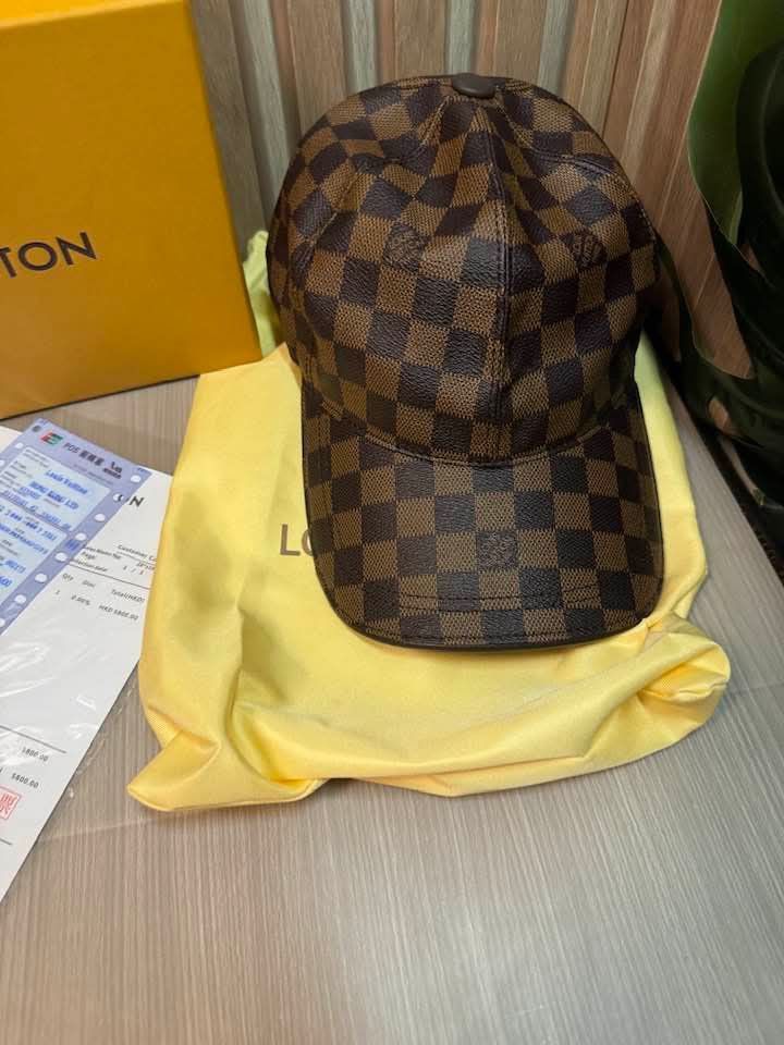 Lv Damier cap (Category: Luxury Apparel) located in Manila. Submitted by vilmabrandedukaybags (Listing ID 1469077477, Image 2). Description: Lv Damier cap medium size.