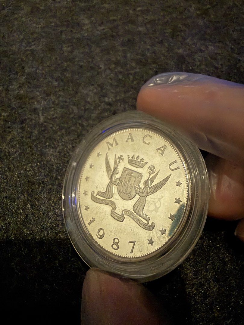 Macau Commemorative Coins Set with Cases (Category: Currency) located in Manila. Submitted by grandpenguin0925 (Listing ID 1469157859, Image 2). Description: - vintage commemorative coins from Macau (dated 1987) - Includes original presentation boxes from prestigious mints like the Royal Mint and Pobjoy Mint - Comes in blue, red, and dark display cases - Every coin is safely secured in a clear protective capsule - Excellent collectible condition,
