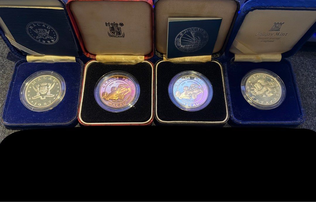 Macau Commemorative Coins Set with Cases (Category: Currency) located in Manila. Submitted by grandpenguin0925 (Listing ID 1469157859, Image 1). Description: - vintage commemorative coins from Macau (dated 1987) - Includes original presentation boxes from prestigious mints like the Royal Mint and Pobjoy Mint - Comes in blue, red, and dark display cases - Every coin is safely secured in a clear protective capsule - Excellent collectible condition,