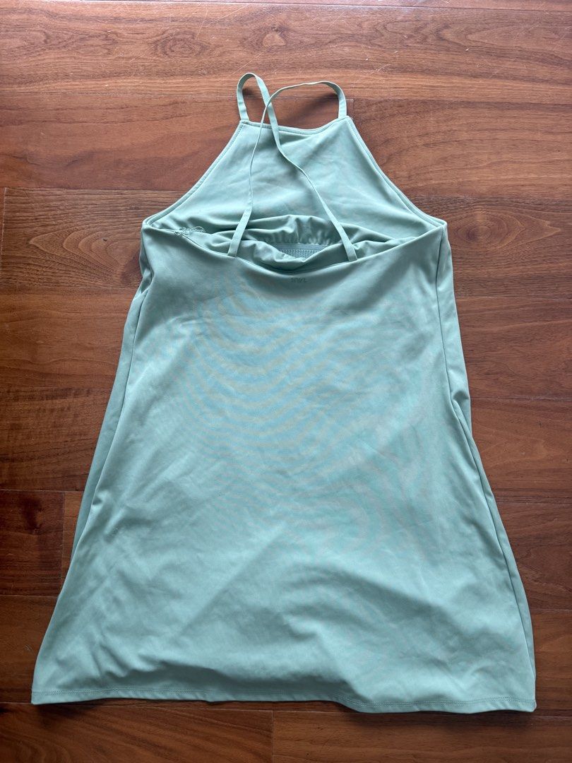 Madewell MWL Green Active Dress Size M (Category: Dresses) located in Manila. Submitted by cristycrab247 (Listing ID 1468968352, Image 2). Description: Madewell MWL active dress in sage green. Built-in shorts underneath, high neckline, crisscross straps in back. Size Medium. Made from 79 percent recycled polyester and 21 percent elastane. Original tags attached, never worn..