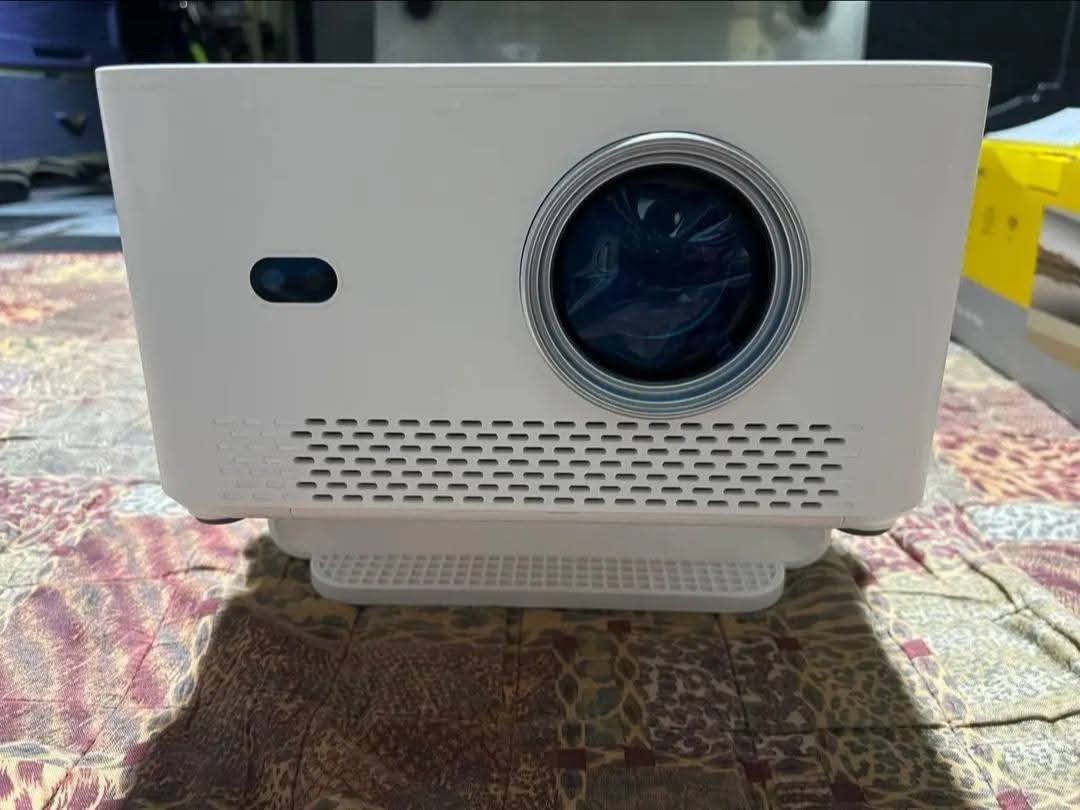 MAGCUBIC HY450MAX (Category: Projectors) located in Quezon City. Submitted by jcrafty.co (Listing ID 1469084989, Image 3). Description: FOR SALE MAGCUBIC HY450MAX PROJECTOR BRANDNEW✅ 7000 ONLY Key Specifications Resolution: Native 1080p Full HD with support for up to 4K and 8K video decoding. Brightness: 1100 ANSI Lumens, providing better visibility under ambient light compared to older models. Contrast Ratio: 2000:1 with HDR10 support. Hardware: