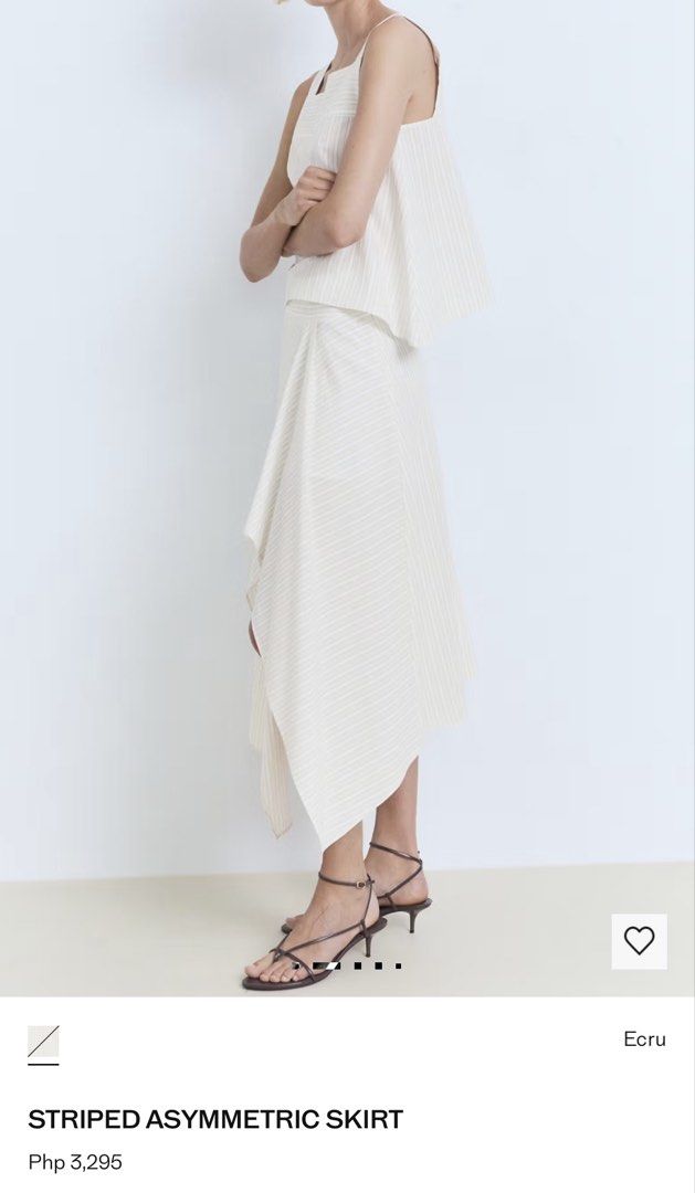 Mango Striped Asymmetric Skirt Ecru (Category: Skirts) located in Antipolo. Submitted by water.mellie (Listing ID 1469067700, Image 3). Description: - Color: Ecru with subtle all-over stripes - Size medium, fits true to size - Design: Asymmetric drape with an uneven hemline - Fabric: Lightweight and comfortable - Perfect for: Smart casual outfits - Original Retail Price: PHP 3,295 Pay by Maribank, Gcash, Maya J&T shipping from Lower Antipolo.