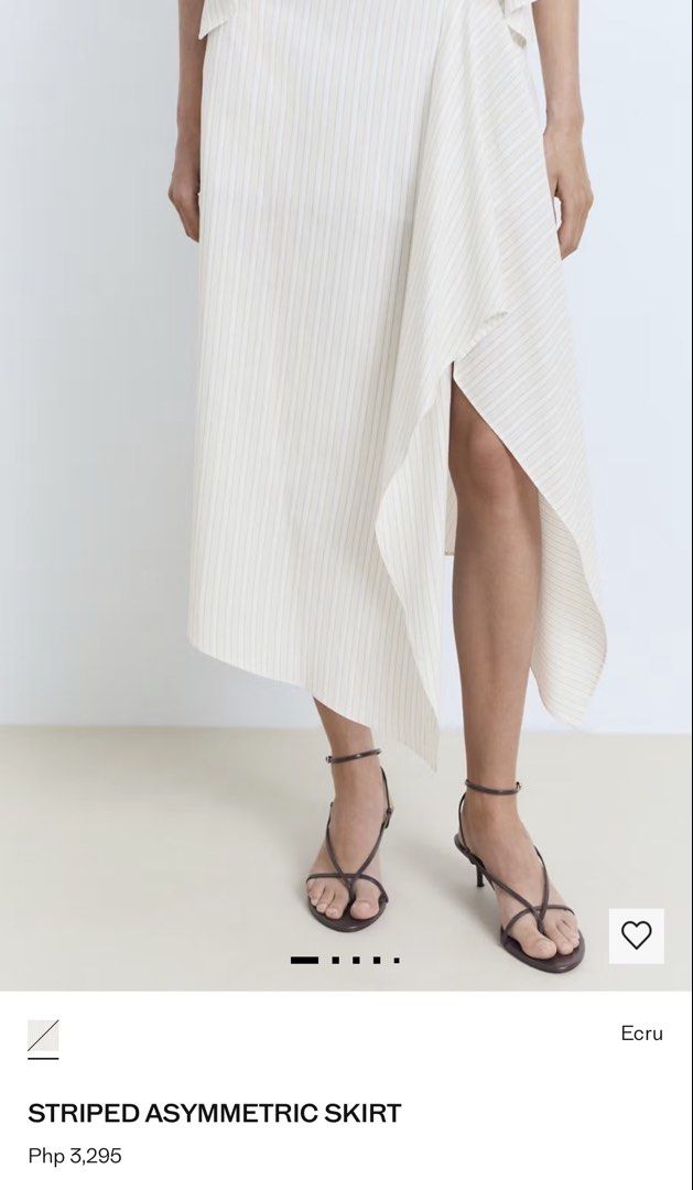 Mango Striped Asymmetric Skirt Ecru (Category: Skirts) located in Antipolo. Submitted by water.mellie (Listing ID 1469067700, Image 2). Description: - Color: Ecru with subtle all-over stripes - Size medium, fits true to size - Design: Asymmetric drape with an uneven hemline - Fabric: Lightweight and comfortable - Perfect for: Smart casual outfits - Original Retail Price: PHP 3,295 Pay by Maribank, Gcash, Maya J&T shipping from Lower Antipolo.