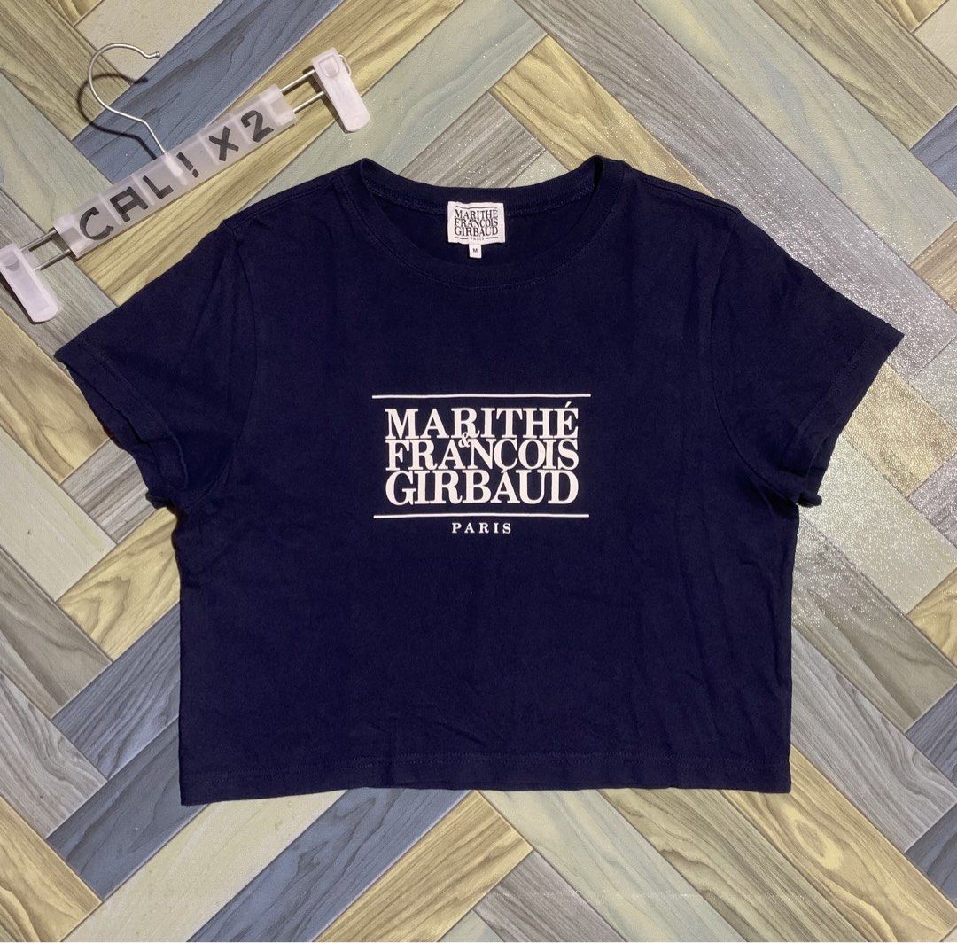 MARITHE FRANCOIS GIRBAUD CLASSIC LOGO CROP TEE (Category: Shirts) located in Kapalong. Submitted by ac_thrift (Listing ID 1469098144, Image 2). Description: MARITHE FRANCOIS GIRBAUD CLASSIC LOGO CROP TEE Size: Medium Dimes: W18 x L18 Color rate: 10/10 Condition: Excellent/ Good as new MoP: Gcash Location: Mindanao, Davao del Norte, Kapalong, 8113.