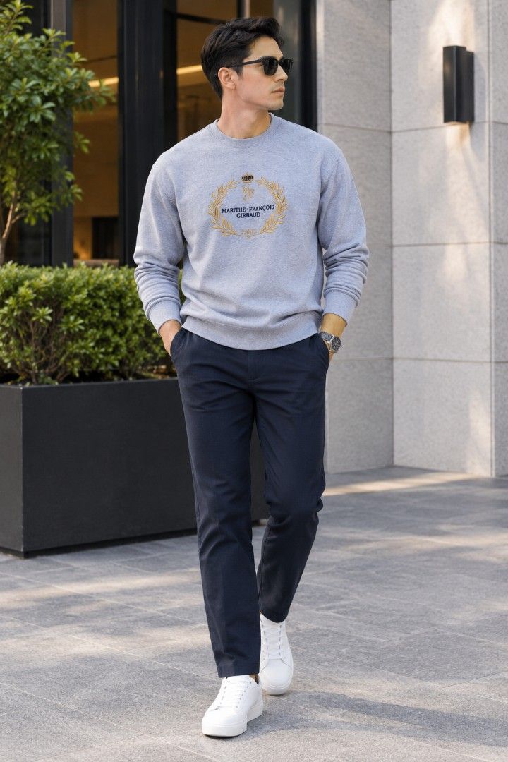Marithe Francois Girbaud Grey Sweatshirt Size L (Category: Coats, Jackets and Outerwear) located in Manila. Submitted by purefire-477a (Listing ID 1469078263, Image 2). Description: - Brand: Marithe Francois Girbaud - Style: Crewneck sweatshirt - Color: Grey - Size: Large (Relaxed fit) - Measurements: 23 inches width x 26 inches length - Details: Vibrant gold and navy chest embroidery with laurel wreath and crown graphic - Material: Soft cotton b