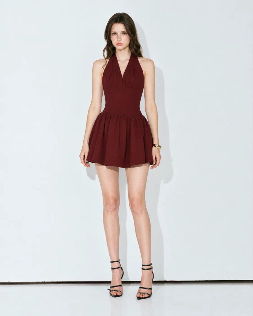 Maroon Halter Neck Mini Dress (Category: Dresses) located in Makati City. Submitted by kimberlyjohn (Listing ID 1468979398, Image 2). Description: - Color: Rich wine red / maroon - Style: Halter neck with deep V-neckline and open back - Fit: Fitted bodice with a flared pleated skirt - Closure: Secure back zipper - Condition: Never worn - Ideal for: Parties and night outs.
