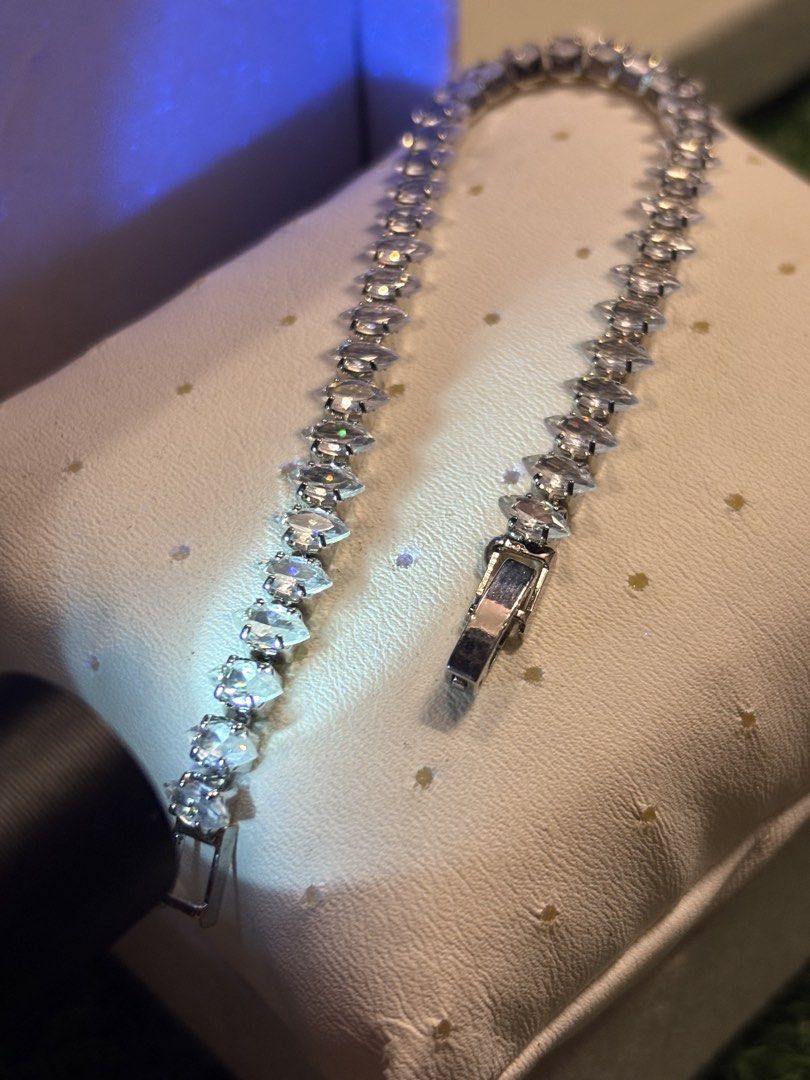 Marquise style tennis bracelet (Category: Bracelets) located in Davao. Submitted by ememlou17 (Listing ID 1469071088, Image 3). Description: tennis beacelet Size7-7.5 No markings Uv reactive Rodium/ Platinum over copper based metal Tarnish resistant with extra care Message me directly📩.