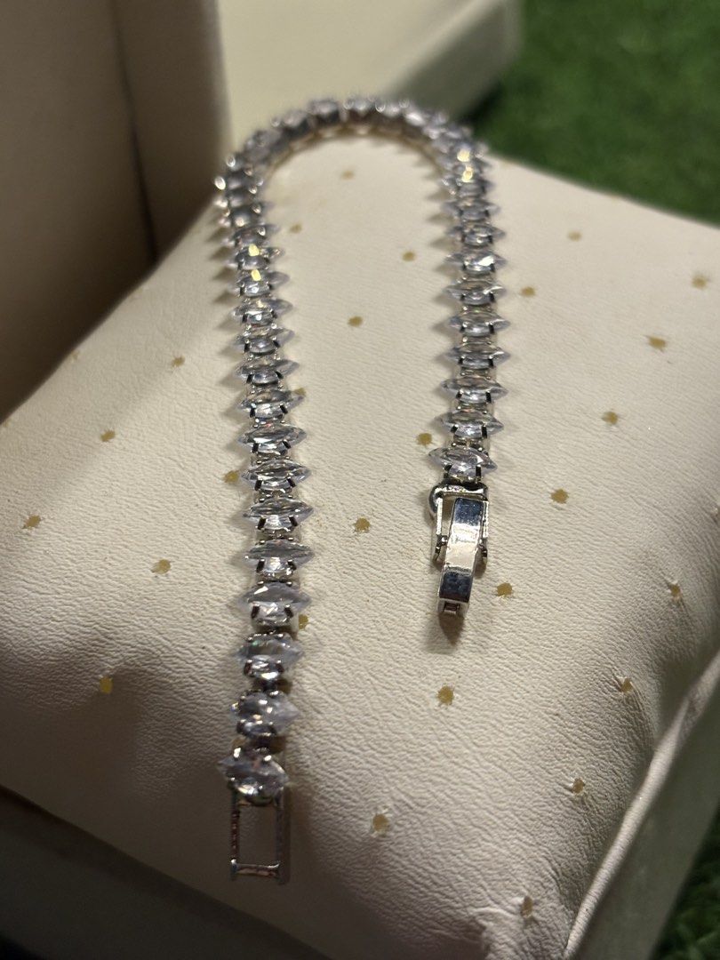 Marquise style tennis bracelet (Category: Bracelets) located in Davao. Submitted by ememlou17 (Listing ID 1469071088, Image 2). Description: tennis beacelet Size7-7.5 No markings Uv reactive Rodium/ Platinum over copper based metal Tarnish resistant with extra care Message me directly📩.