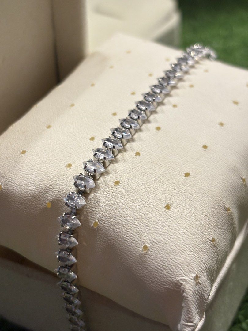 Marquise style tennis bracelet (Category: Bracelets) located in Davao. Submitted by ememlou17 (Listing ID 1469071088, Image 1). Description: tennis beacelet Size7-7.5 No markings Uv reactive Rodium/ Platinum over copper based metal Tarnish resistant with extra care Message me directly📩.