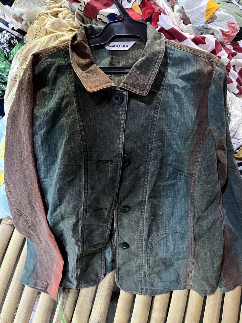 Marylester Two-Tone Button-Up Jacket Green Brown (Category: Coats, Jackets and Outerwear) located in Pilar. Submitted by fast-flip-ni-miko. (Listing ID 1469041402, Image 1). Description: - Brand: Marylester (Made in Japan) - Color: Dark green and brown tones with contrast collar and sleeves - Closure: Button-up front - Pockets: Two front pockets - Style: Heavy washed fabric look, perfect layering piece for cooler days - Condition: Good pre-loved 