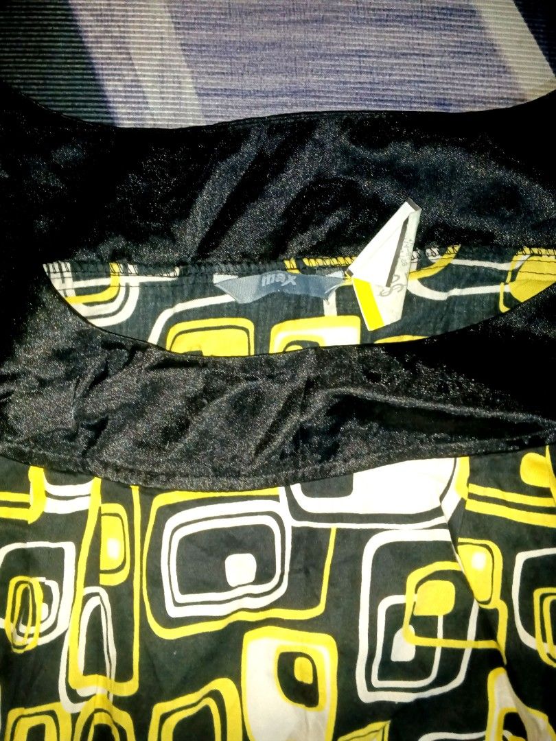 Max studio dress (Category: Announcements) located in Manila. Submitted by icamalicdem29 (Listing ID 1469066501, Image 2). Description: s/m Max Studio graphic mid-century style mini dress featuring a distinctive retro geometric pattern of rounded squares and rectangles in yellow, white, and black. This design showcases a wide, structured square-neck silhouette accented with solid black bands along the neckline, short sleeve cuffs, and bottom heml