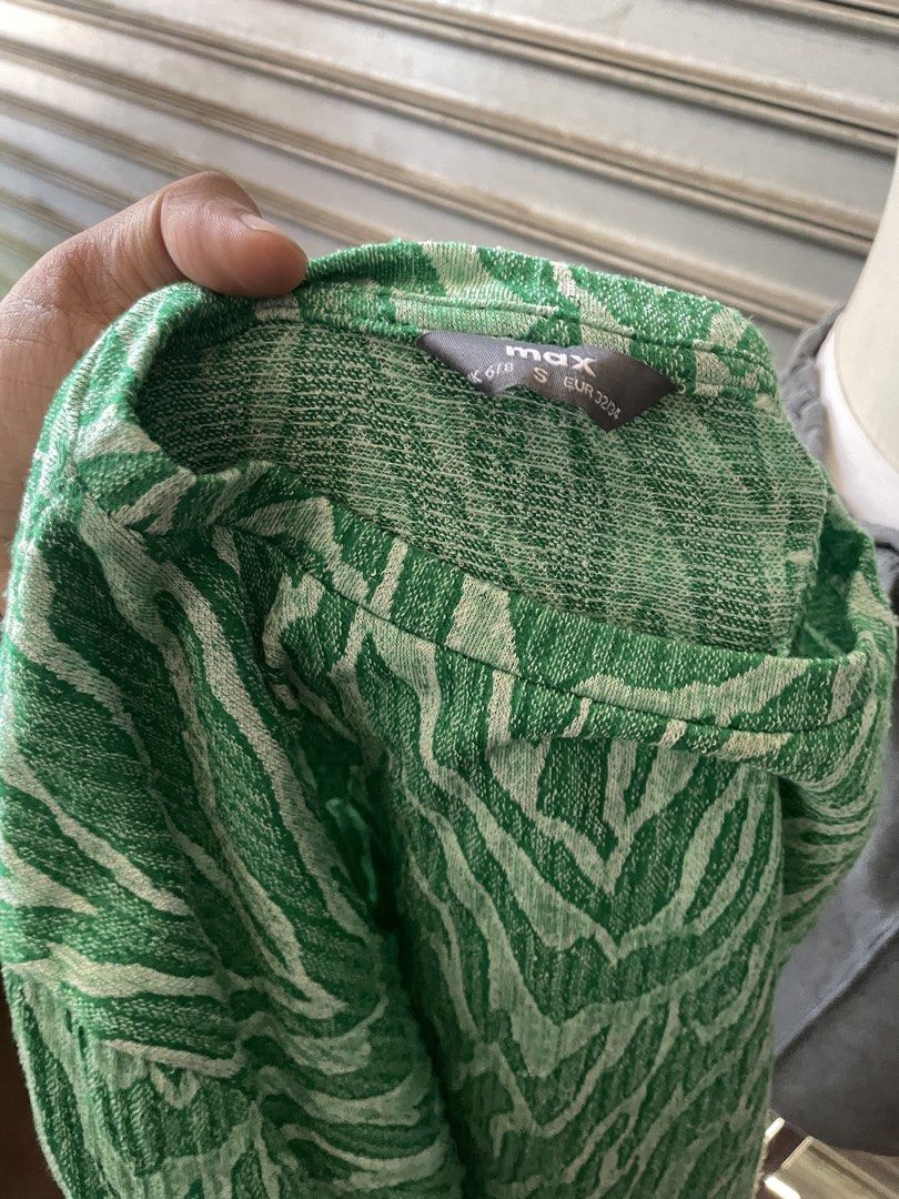 Max Green Zebra Print Long Sleeve Top Size S (Category: Longsleeves) located in Davao. Submitted by riab_qt (Listing ID 1468946030, Image 2). Description: - Brand: Max - Design: Green and white zebra print - Size: S on tag (fits EUR 32/34) - Details: Long sleeves, round neckline, textured knit fabric - Styling: Easy to pair with jeans or skirts for casual outfits.