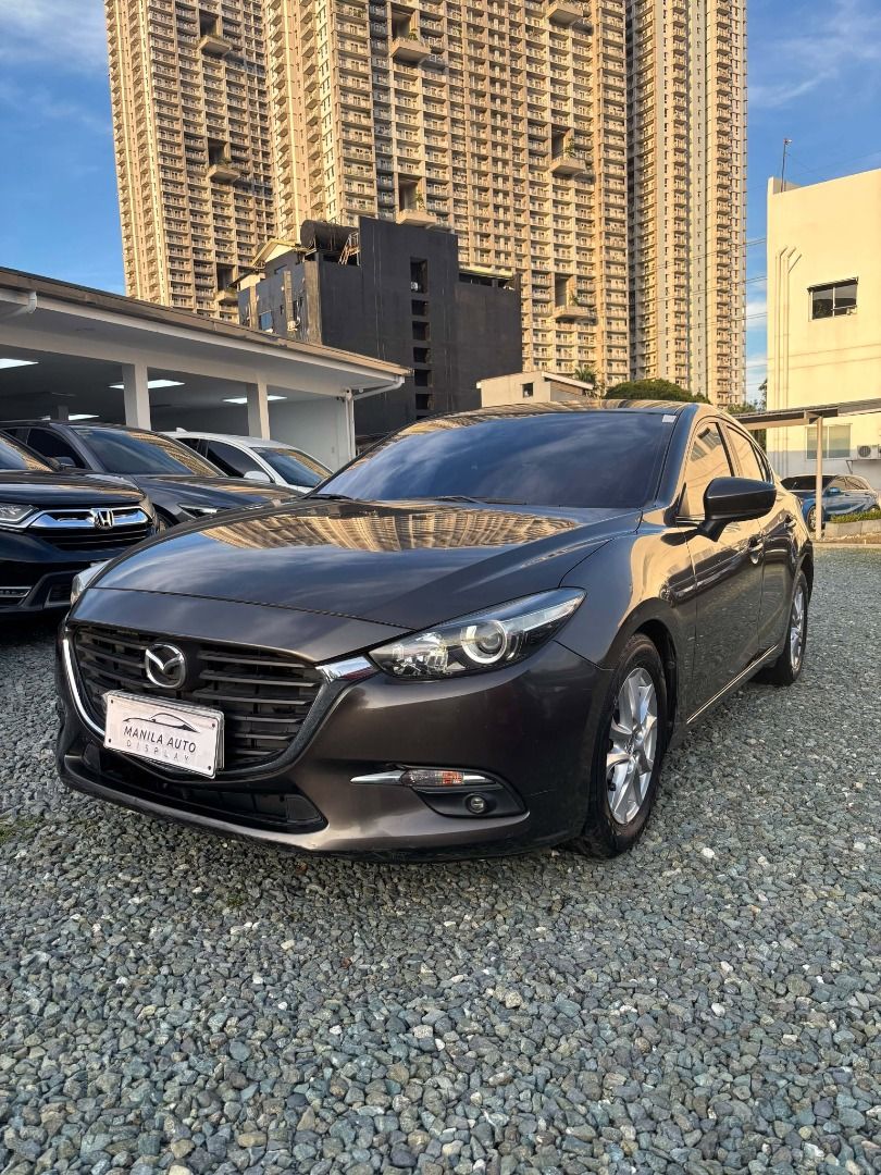 Mazda 3 1.5L Hatchback Auto (Category: Used Cars) located in Pasig City. Submitted by pureocean-057512 (Listing ID 1468956156, Image 3). Description: 2019 MAZDA 3 1.5L HATCHBACK GAS AUTOMATIC TRANSMISSION Downpayment: ₱174,151 Titanium Flash 76tkms mileage Automatic Transmission 1.5L Gasoline Engine 7 ending plate Power Windows Power Steering Power Side Mirrors All power Central Locking Fog lamps Dual airbags Touch Screen Display Bluetooth Comple