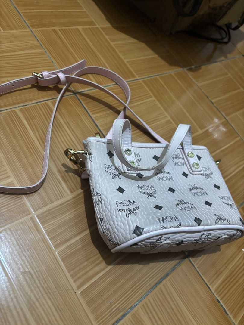 MCM cross-body 2 way bag (Category: Cross-body Bags) located in Manila. Submitted by jawnty (Listing ID 1469118898, Image 2). Description: MCM Sling Bag * MCM sling bag * Very good condition * 550 Pesos Negotiable Sampaloc, Manila Loc ‼️ Can do shipping via Lalamove or J&T, COD via LBC.