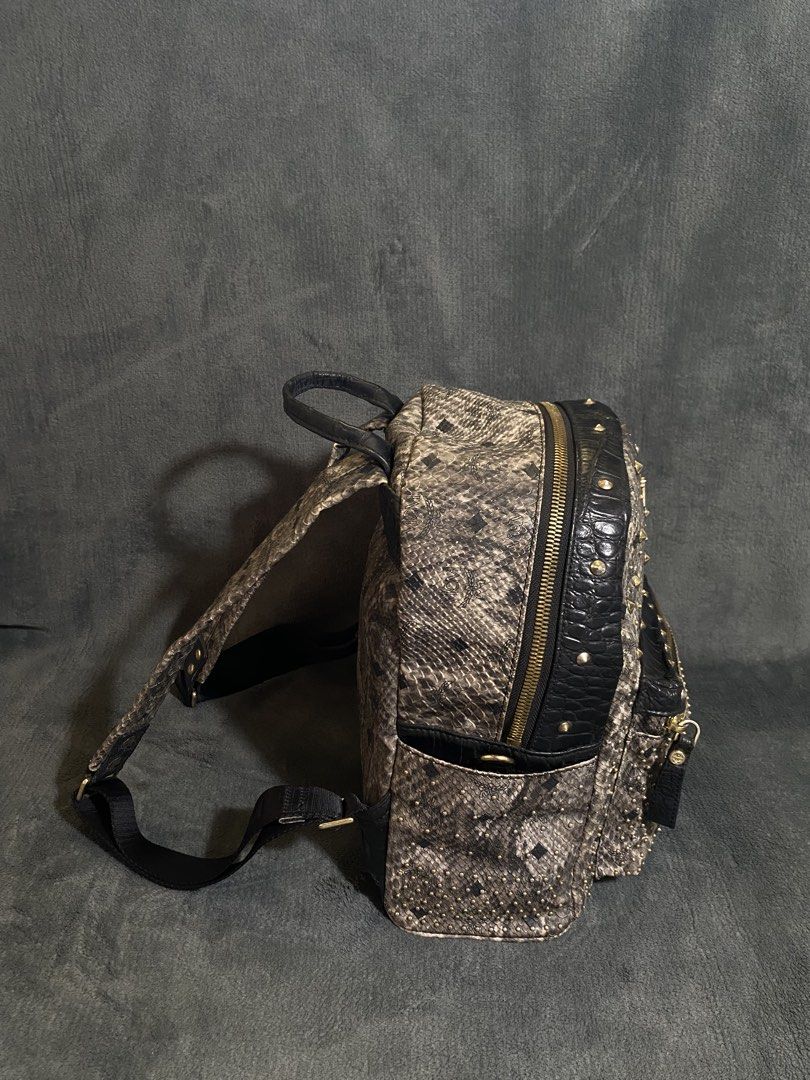 MCM Snake Skin Printed Backpack (Category: Backpacks) located in San Lorenzo. Submitted by thriftnigeorge (Listing ID 1468999429, Image 2). Description: EXCELLENT CONDITION NO MAJOR ISSUES/SIGN OF USAGE GOOD LEATHER .
