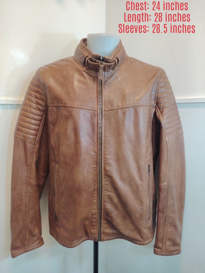 Men's Brown Biker Leather Jacket Quilted Shoulders (Category: Coats, Jackets and Outerwear) located in La Trinidad. Submitted by padasem_kadi (Listing ID 1468960823, Image 2). Description: - Style: Men's brown leather jacket with a cool vintage distressed finish - Details: Quilted panels on shoulders and lower back, stand-up collar with buckle closure - Pockets & Closure: Full zip front with matching zippered side pockets - Size (Flat Lay): Chest