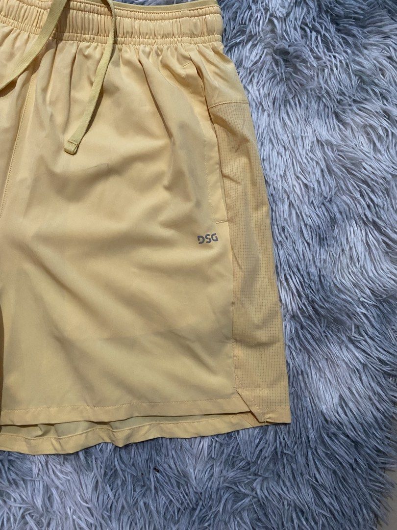 Men’s DSG Sporting Gear Running Shorts (Category: Activewear) located in Carmen. Submitted by yawbuangaka (Listing ID 1468994871, Image 3). Description: Men’s DSG Sporting Gear Running Shorts Soft Yellow Small Waistline - 30 Length - 16 Excellent.