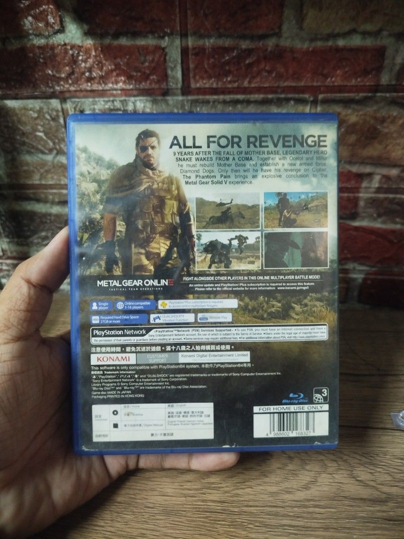 (With Map) Metal Gear Solid V The Phantom Pain PS4 Game (Category: PlayStation) located in Binan City. Submitted by pumpkiiin02 (Listing ID 1468991488, Image 2). Description: - Title: Metal Gear Solid V The Phantom Pain - Platform: PlayStation 4 (PS4) - Publisher: Konami - Genre: Tactical Espionage Action - Inclusions: Original blue case, game disc, and map insert manual - Region: Asia / English compatible - Condition: Clean disc surface, case cl