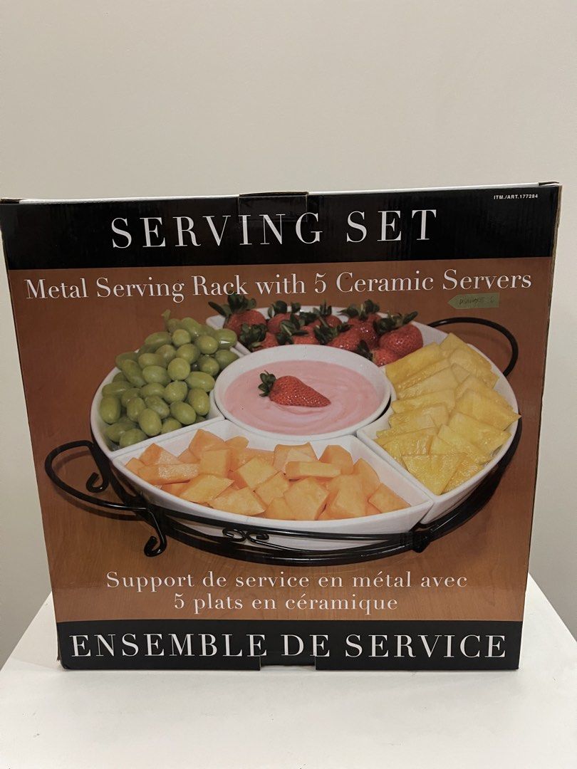 Metal Serving Rack with 5 Ceramic Servers (Category: Dinnerware & Cutlery) located in Quezon City. Submitted by bravehorse_f1f6d5 (Listing ID 1469121981, Image 1). Description: - Set includes a sturdy black metal frame and 5 white ceramic servers - Perfect for parties, snack platters, fruit displays, and dips - Ceramic dishes fit neatly into the frame - Comes with a box for easy and organized storage - Hand wash recommended - Ready for your next 