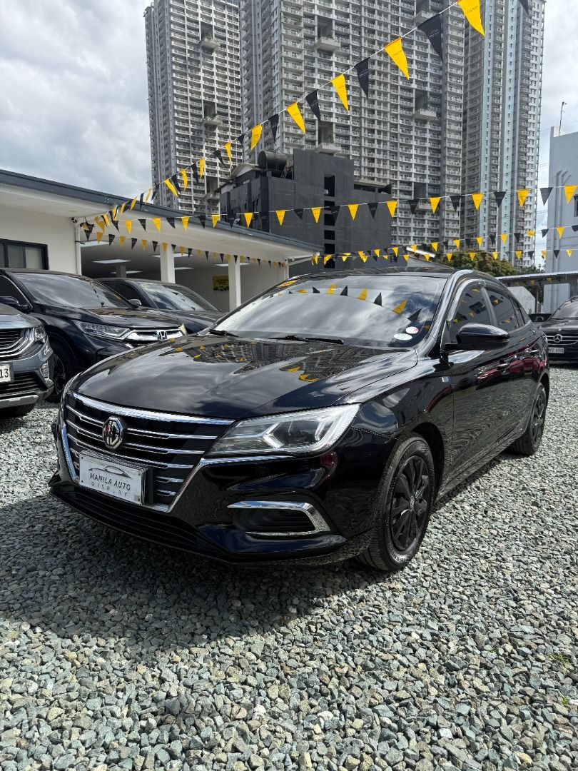 MG 5 Manual (Category: Used Cars) located in Pasig City. Submitted by pureocean-057512 (Listing ID 1469026607, Image 3). Description: 2022 MG 5 GAS MANUAL TRANSMISSION Downpayment: ₱120,405 Black 7 ending plate Gasoline Engine Manual Transmission 67tkms mileage Rear parking sensors Reverse camera Touchscreen infotainment Steering wheel controls Good running condition Fresh inside and out Presentable paint No hidden issue As-is-where is PLEASE CAL