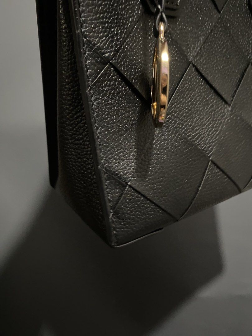Michael Kors Quilted Black Leather (Category: Luxury Bags & Wallets) located in Batangas. Submitted by bagstolove3.0 (Listing ID 1469106852, Image 3). Description: - Brand: Michael Kors - Material: Genuine leather with pebble leather back - Design: Quilted diamond pattern on the front - Hardware: Premium gold-tone with signature MK hanging charm - Closure: Secure top zipper - Features: Double top handles, structured shape, spacious interior - No 