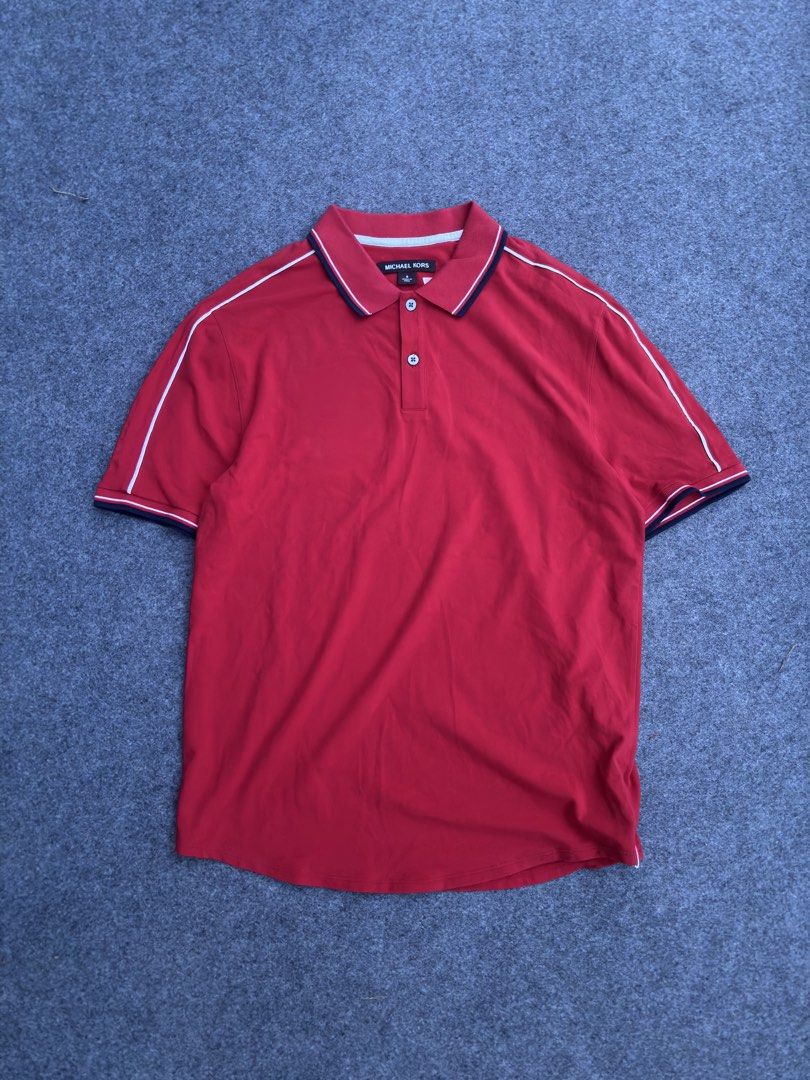 Michael Kors Red Polo Shirt Size S (Category: Tshirts & Polo Shirts ) located in Lapu Lapu. Submitted by thatdamngrails (Listing ID 1468968392, Image 2). Description: - Brand: Michael Kors - Size: Small-medium - Color: Red with white and dark trim piping - Details: Two-button placket, ribbed collar/cuffs, vertical tonal logo on right sleeve - Origin: Made in Peru - Condition: Clean fabric throughout, well-maintained.