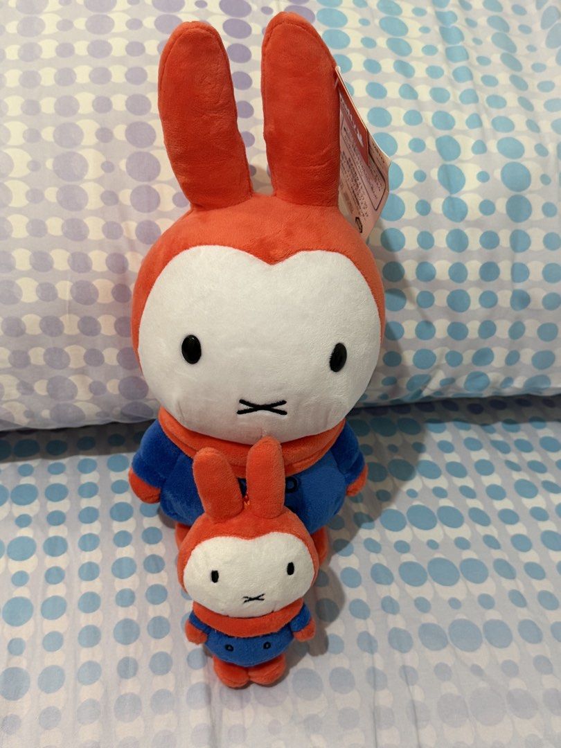 Miffy plush toy set (Category: Plushies & Soft Toys) located in Paranaque City. Submitted by soduhwhatever (Listing ID 1469089990, Image 1). Description: - Set of 2 matching Miffy plush toys sold together - Bigger plush stands with iconic orange ears, blue outfit, and white face - Smaller matching plush hangs right in front - Super soft fabric all over for maximum cuddliness - Brand new with original tags still attached to the large one - Perfect