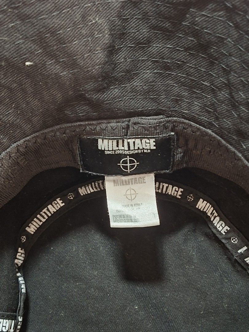 Millitage Black Bucket Hat (Category: Caps & Hats) located in Baguio. Submitted by restyrille77846 (Listing ID 1469066442, Image 3). Description: - Brand: Millitage - Color: Classic Black - Style: Casual streetwear bucket hat - Material: 100% Cotton for comfort - Details: Inner taped seams with branded text pattern and woven label inside - Fit: Standard fit, easy to pair with any casual outfit - Condition: Brand new / Excellent.