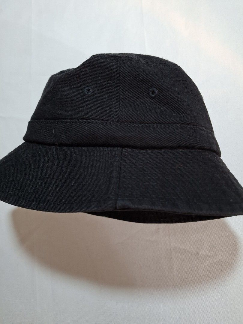 Millitage Black Bucket Hat (Category: Caps & Hats) located in Baguio. Submitted by restyrille77846 (Listing ID 1469066442, Image 1). Description: - Brand: Millitage - Color: Classic Black - Style: Casual streetwear bucket hat - Material: 100% Cotton for comfort - Details: Inner taped seams with branded text pattern and woven label inside - Fit: Standard fit, easy to pair with any casual outfit - Condition: Brand new / Excellent.
