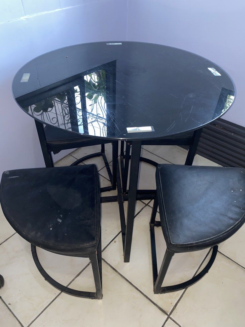 Minimalist round table with 4 chairs (Category: Tables & Sets) located in Cavite. Submitted by itsanalyn04 (Listing ID 1469025870, Image 2). Description: Minimalist round table with 4 chairs Drop your price Negotiable RFS: decluttering.