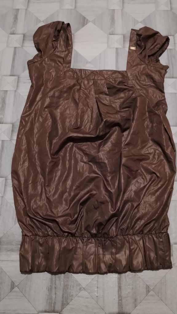 Miss Sixty Brown Blouse Small (Category: Blouses) located in Morong. Submitted by sanjuancla56319 (Listing ID 1468972519, Image 1). Description: - Brand: Miss Sixty - Size: Small - Material: 100% polyester - Color: Brown - Design: Gathered bubble hem, cap sleeves with subtle ruching - Detail: Branded metal logo tag on the right strap - Origin: Made in India - Condition: Clean interior tag with care instructions.