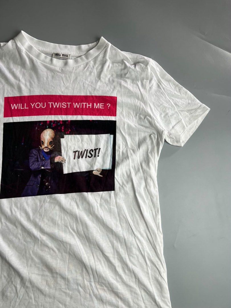 Miu Miu - Twist With Me 2019 Collection - Tee (Category: Luxury Apparel) located in San Pablo. Submitted by hiddenrygn (Listing ID 1468944149, Image 3). Description: Miu Miu - Twist With Me 2019 Collection - Tee Size : M(17” 24”) No flaws Excellent to new condition Authentic DM!.