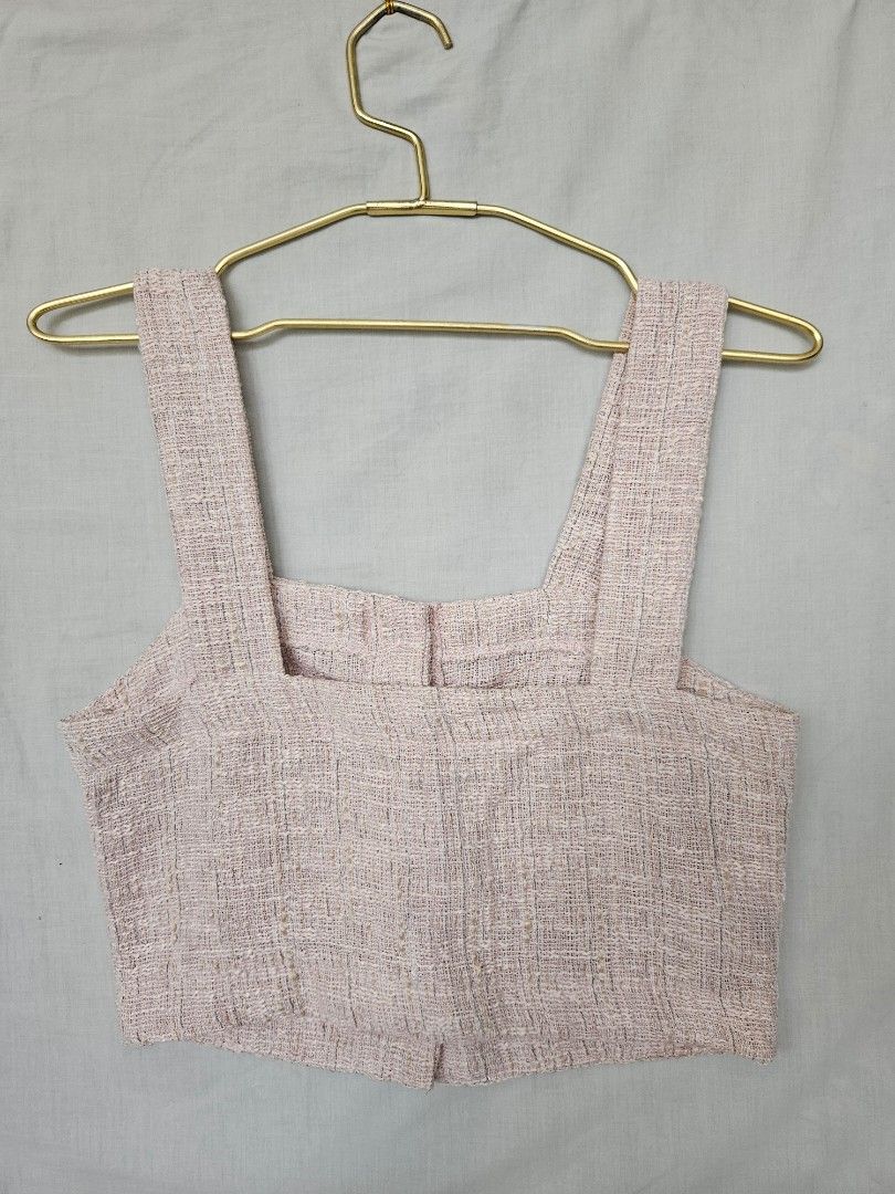 MNG Mango Pink Tweed Crop Top (Category: Sleeveless) located in Quezon City. Submitted by _pcloset (Listing ID 1469005360, Image 2). Description: - Brand: Mango (MNG) - Style: Tweed crop top with straight neckline - Color: Pink with subtle metallic threading - Details: Thick shoulder straps, functional button-down front with 4 metallic round buttons - Fit: Short length, pairs perfectly with high-waisted bottoms - Condition: Excellent / Ready to s