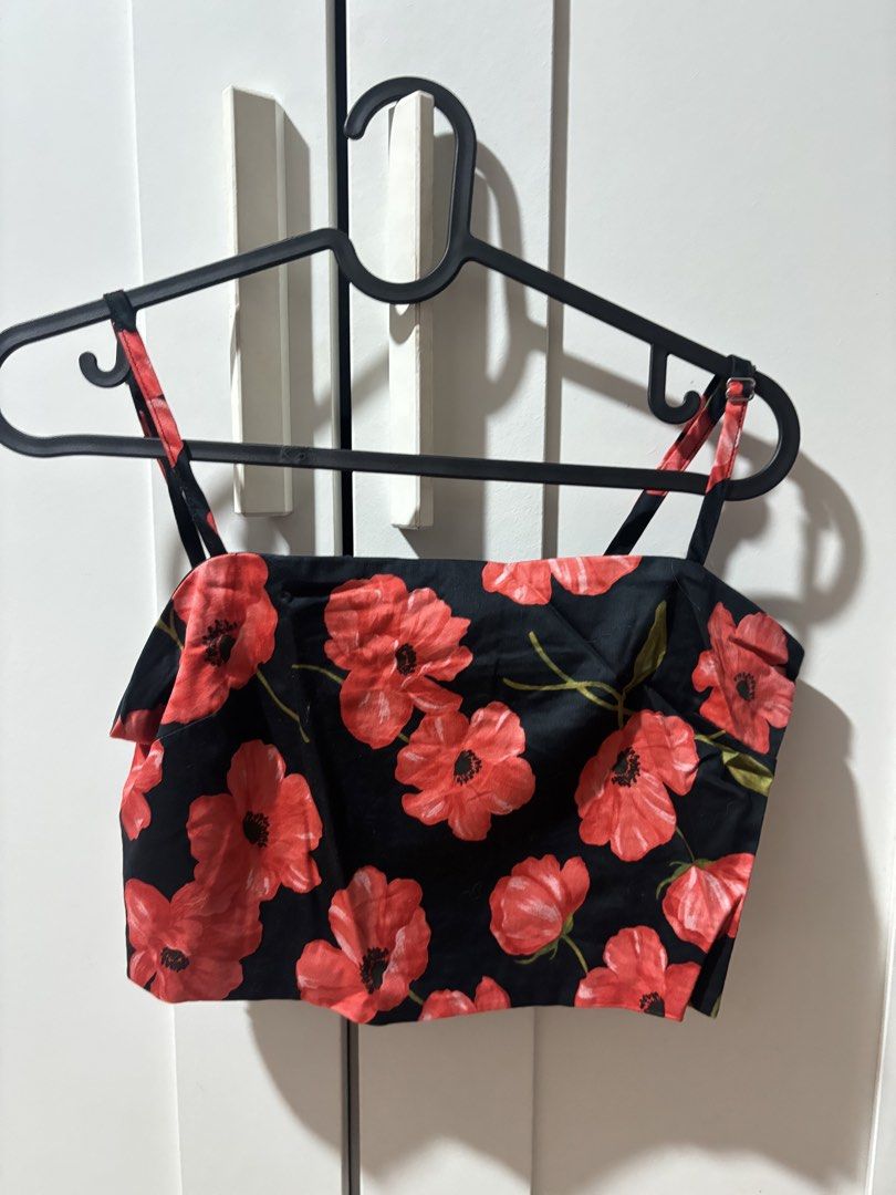 MNG Mango Red Floral Black Crop Top Size S (Category: Blouses) located in Quezon City. Submitted by stellawinxclub (Listing ID 1469014633, Image 1). Description: - Brand: Mango - Style: Black crop top with bright red poppy floral print - Details: Square neckline, thin adjustable straps, and stretchy back band - Size: EUR-USA S / MEX CH (Small) - Condition: Worn a few times, well-maintained and in good shape - Styling: Perfect to pair with high-wa