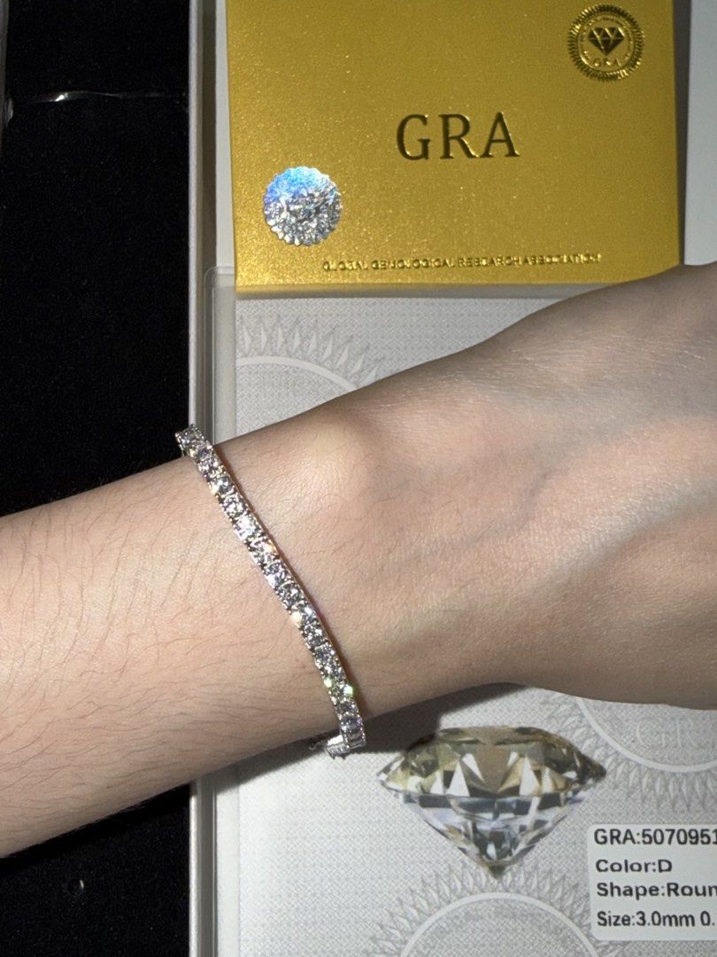 Moissanite Tennis Bracelet GRA (Category: Bracelets) located in Taytay. Submitted by kayecincoda (Listing ID 1468180450, Image 2). Description: Moissanite Tennis Bracelet - Size: 15cm length, 3mm thick, 0.3ct - Color Grade: D (highest colorless grade for brilliant sparkle) - Setting: Pure silver plated in platinum - Inclusions: GRA certificate included as shown - Condition: Brand new and super sparkly under the light.