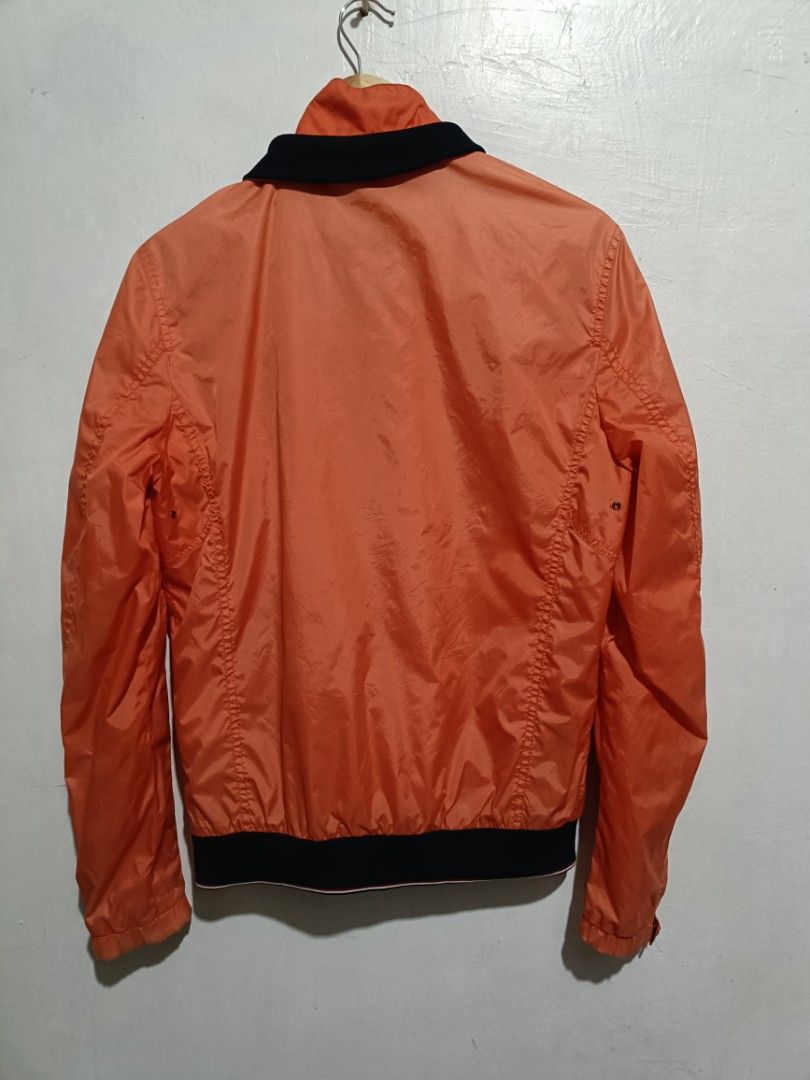 Moncler Antoine Nylon WindBreaker Jacket (Category: Coats, Jackets and Outerwear) located in Las Pinas. Submitted by bckhood_thrift_store (Listing ID 1468992316, Image 2). Description: Moncler Antoine Nylon WindBreaker Jacket (OFF) Size Small pwede run sa Meduim Good Condition 8/10 Color Rate Issue: Slightly Fade Both Sleeves, Zipper Pull, Sewing Defect and Fraying (See Photos ⬇️) ₱200 💵 DM ME 📩📩 Laspiñas/Greenhills Loc 📍.
