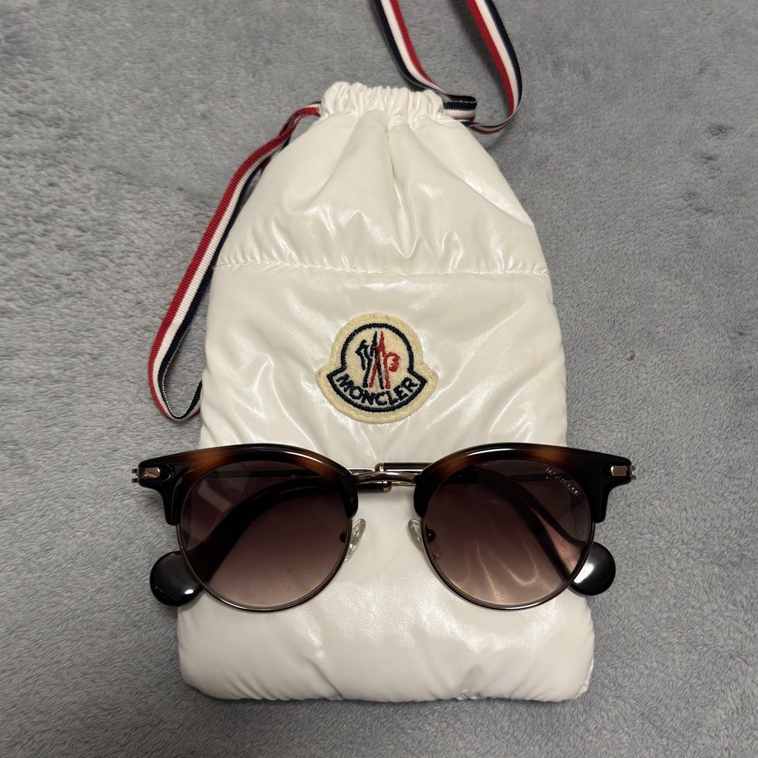 Moncler sunglasses (Category: Sunglasses & Eyewear) located in Quezon City. Submitted by hintstreet (Listing ID 1468930642, Image 1). Description: Complete with card.