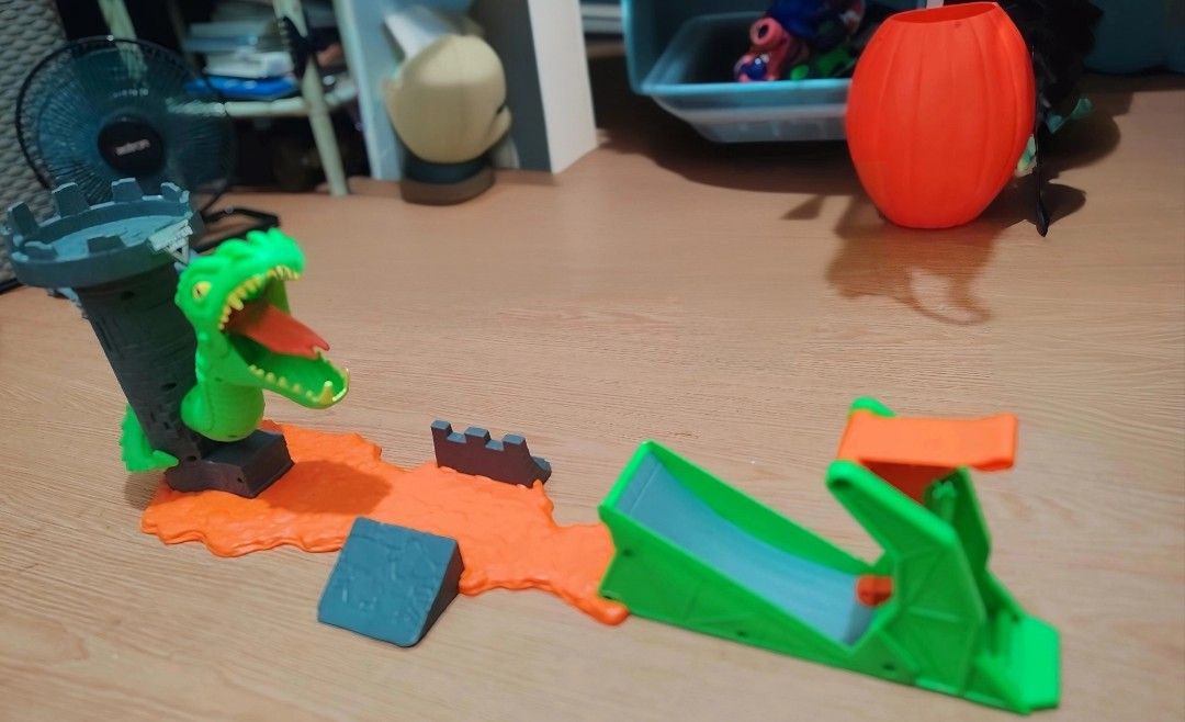 Monster Jam Dragon Launch Play Set (Category: Action & Battle Toys) located in Quezon City. Submitted by lion_s (Listing ID 1469001943, Image 1). Description: - Awesome Monster Jam playset featuring a cool green dragon head design - Includes an orange lava track, ramps, and a built-in launcher for high-flying action - Made with sturdy, durable plastic parts - Perfect gift or addition to any monster truck toy collection.
