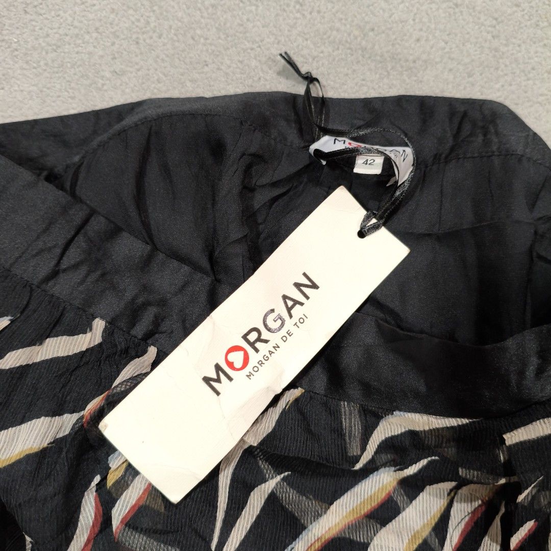 Morgan de toi skirt (Category: Skirts) located in Calatrava. Submitted by ermitany0 (Listing ID 1469096061, Image 2). Description: Morgan de TOI skirt as new condition size: 42 / US 12 check photos for more details ✅⬇️ location: Negros Occidental PM if interested 📩📩📩📩.