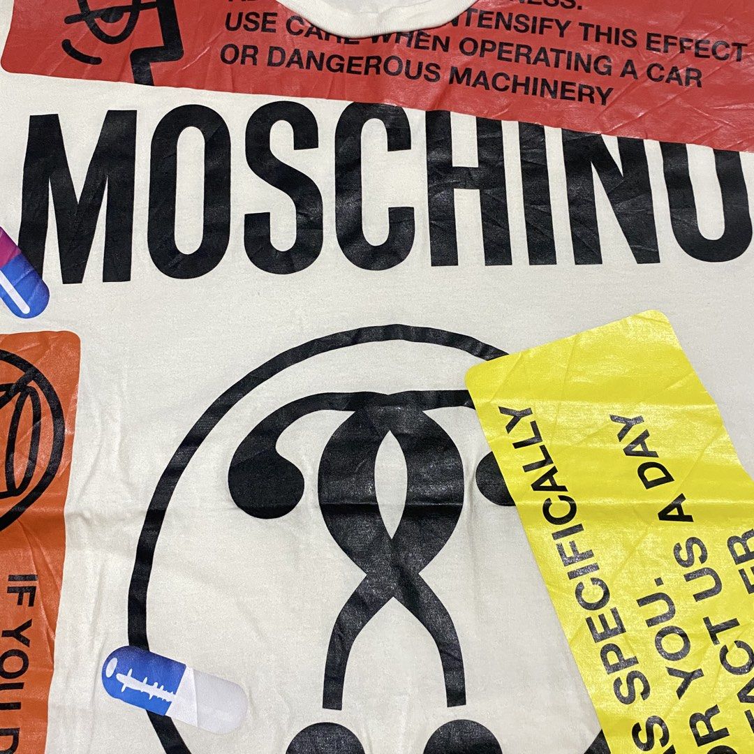 Moschino Big Print (Category: Shirts) located in Mabalacat. Submitted by stellargarments (Listing ID 1469003152, Image 3). Description: Length : 30 Width : 23 Condition : 9/10 buong buo lahat logos complete tags maganda pa tela no yellow stain medjo lukot pa po need wash fresh from bale color may vary due to lighting.