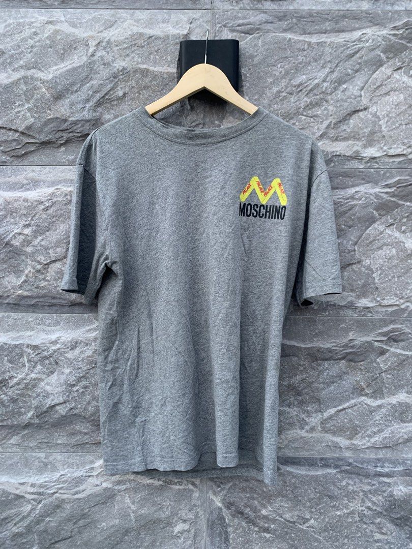Moschino x place (Category: Shirts) located in Lipa City. Submitted by inglowetrust (Listing ID 1469084119, Image 1). Description: Moschino X Palance shirt Size Medium Length: 19x27 Width:19 Color rate 9/10 350 +SF Dm for more details 📩.