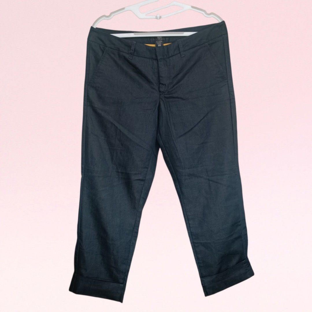 Mossimo Ankle Trousers (Category: Other Bottoms) located in Quezon City. Submitted by firstlovedbyb (Listing ID 1468959863, Image 1). Description: Authentic Mossimo ankle trousers. With 2 side pocket and belt loops. With fixed hem fold. Actual color is midnight blue/black (color in photo may vary due to lighting and phone cam quality). No major flaws or issues. Good as new. Size on tag: 10 Waist: 32 inches Length: 34 inches.