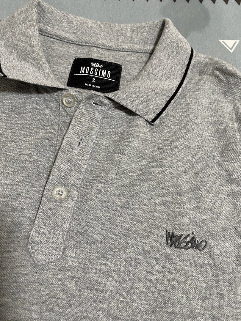 Mossimo Grey Cotton Polo Shirt Size S (Category: Tshirts & Polo Shirts ) located in Taguig. Submitted by maaarrrrrcky (Listing ID 1469014946, Image 2). Description: - Brand: Mossimo - Size: S - Material: 100% breathable cotton - Color: Grey with contrast tipping on the collar - Details: Short sleeves, button placket, ribbed cuffs and collar, embroidered logo on chest - Care: Machine washable - Condition: Excellent / Ready to wear -Can fit to medi