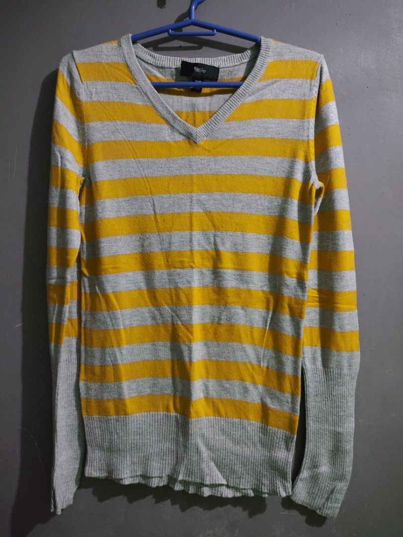Mossimo Striped V-Neck Sweater Size XS (Category: Longsleeves) located in Manila. Submitted by rarelion_c637f7 (Listing ID 1469016303, Image 2). Description: - Brand: Mossimo - Style: V-neck knit sweater with grey and mustard yellow stripes - Size: XS - Features: Long sleeves, ribbed cuffs and hem, lightweight material ideal for layering - Origin: Made in China - Condition: Excellent, tag still attached.