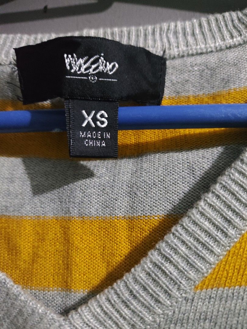 Mossimo Striped V-Neck Sweater Size XS (Category: Longsleeves) located in Manila. Submitted by rarelion_c637f7 (Listing ID 1469016303, Image 3). Description: - Brand: Mossimo - Style: V-neck knit sweater with grey and mustard yellow stripes - Size: XS - Features: Long sleeves, ribbed cuffs and hem, lightweight material ideal for layering - Origin: Made in China - Condition: Excellent, tag still attached.